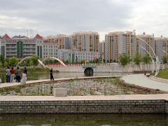 20 Kashgar Donghu East Lake Lotus Pond With Modern Buildings Behind